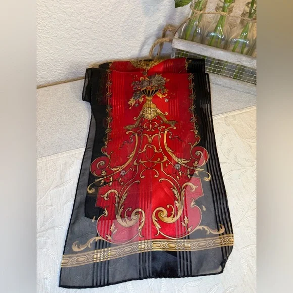 Red, black, and gold silk scarf with floral, filagree and vase motif. 53” x 10” - Picture 3 of 7